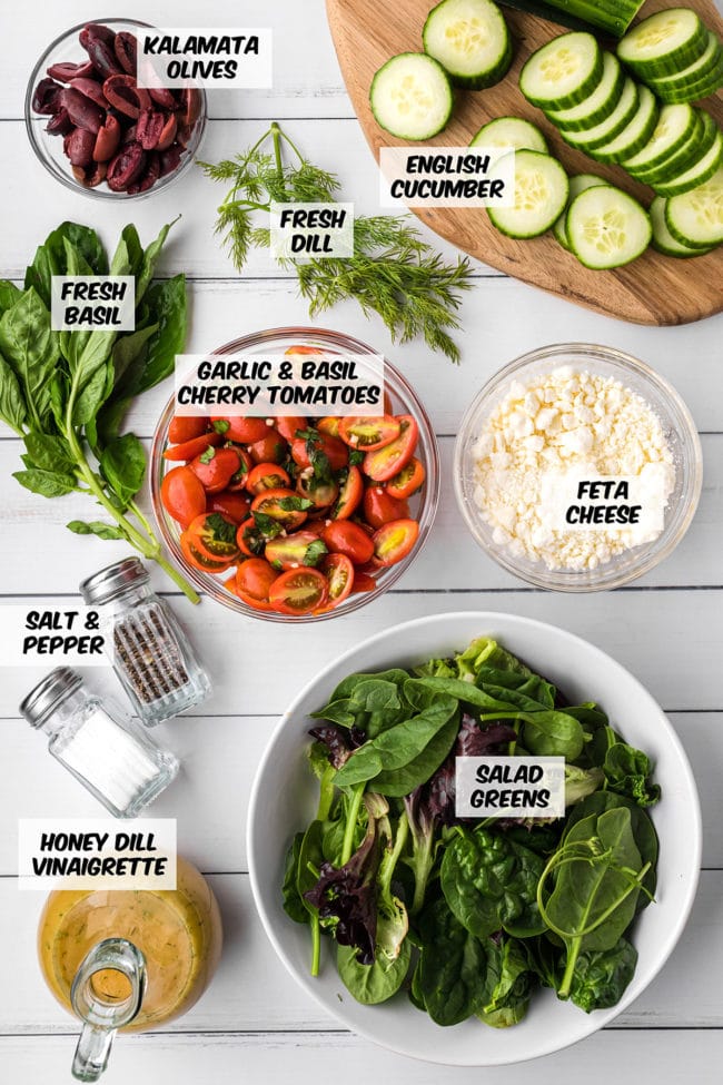 ingredients for tomato cucumber feta salad on a counter