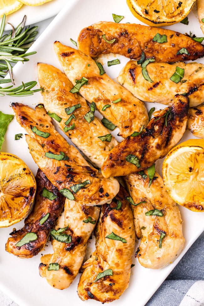 Lemon rosemary grilled chicken on a platter