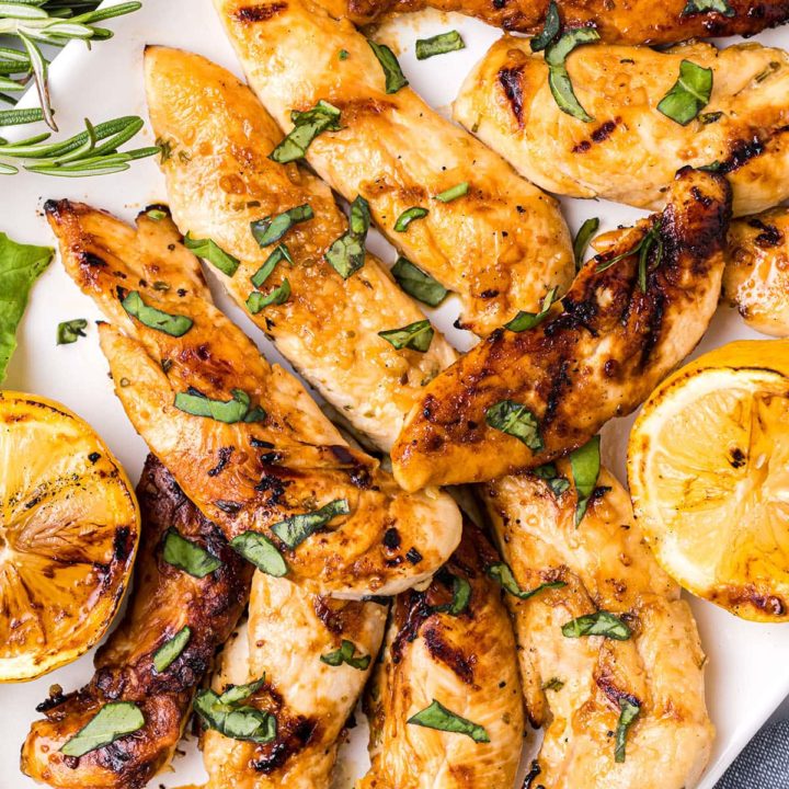 Lemon rosemary grilled chicken on a platter