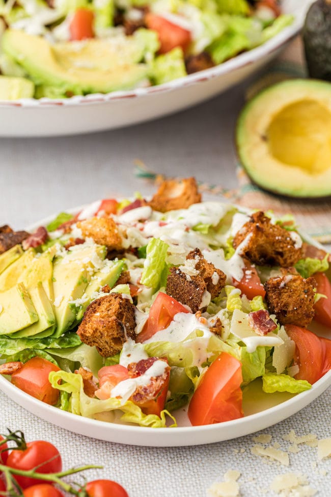 blt salad on a plate with fresh avocado
