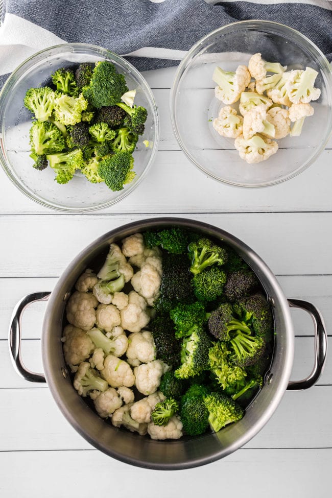 broccoli and cauliflower in a large pot to boil