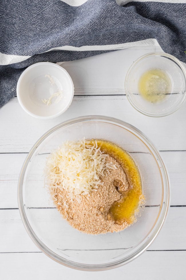 bread crumb topping ingredients in a glass mixing bowl