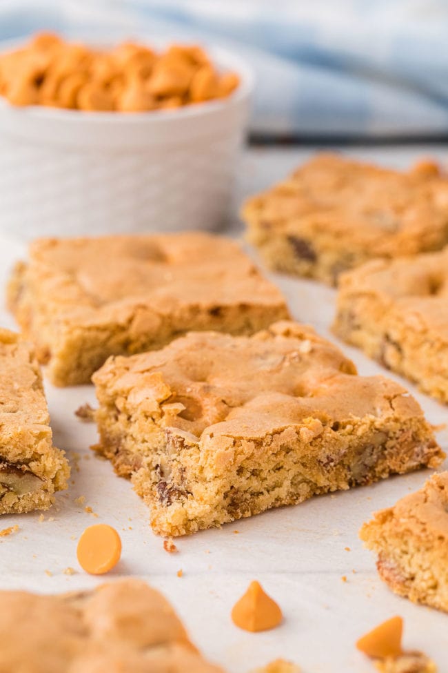 blonde brownies with butterscotch chips on a counter