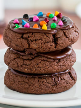 3 brownie cookies stacked with rainbow sprinkles