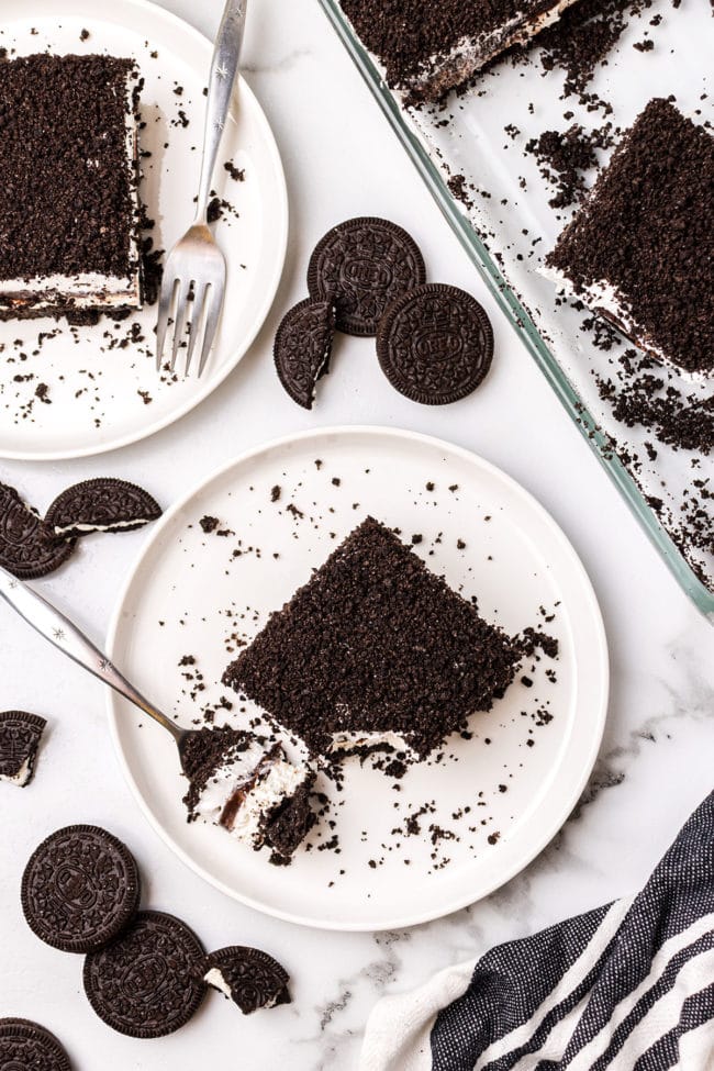 overhead shot of Oreo delight on a plate with a fork and Oreo cookies.