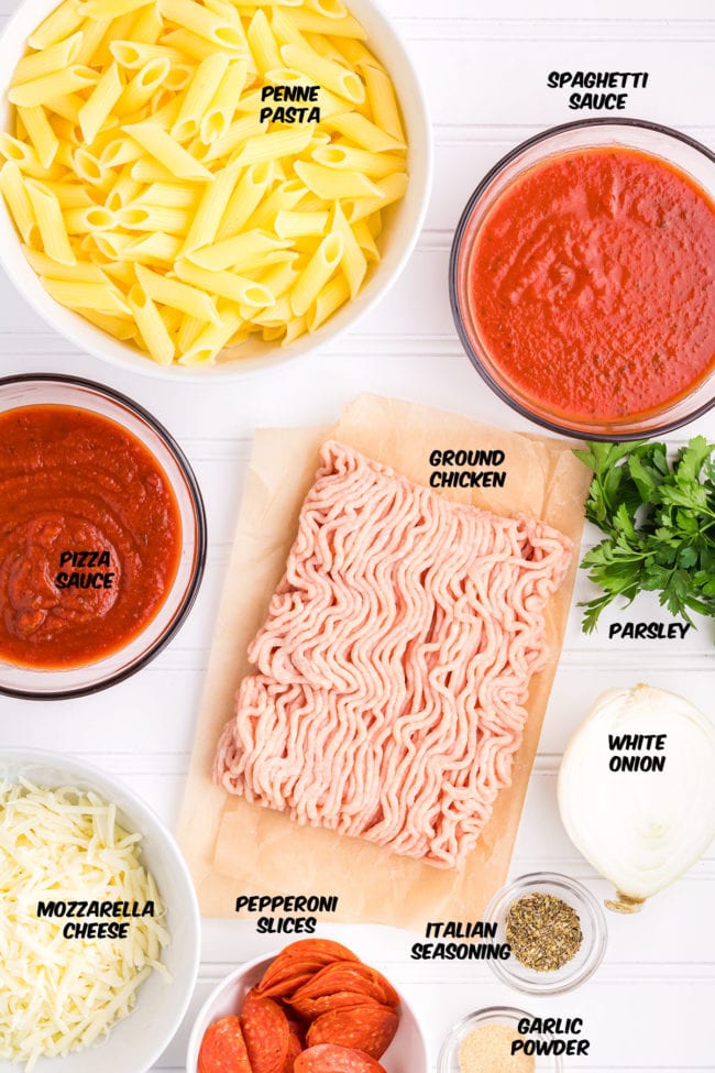 ingredients for pizza pasta bake on a counter