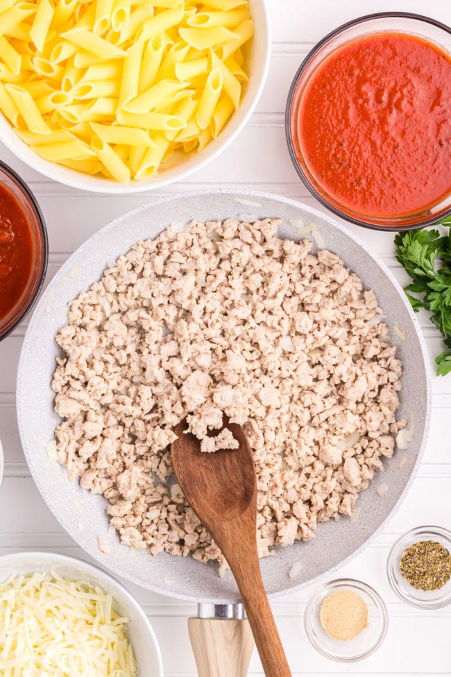 browning ground chicken in a skillet