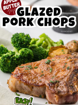 glazed pork chop plated with broccoli