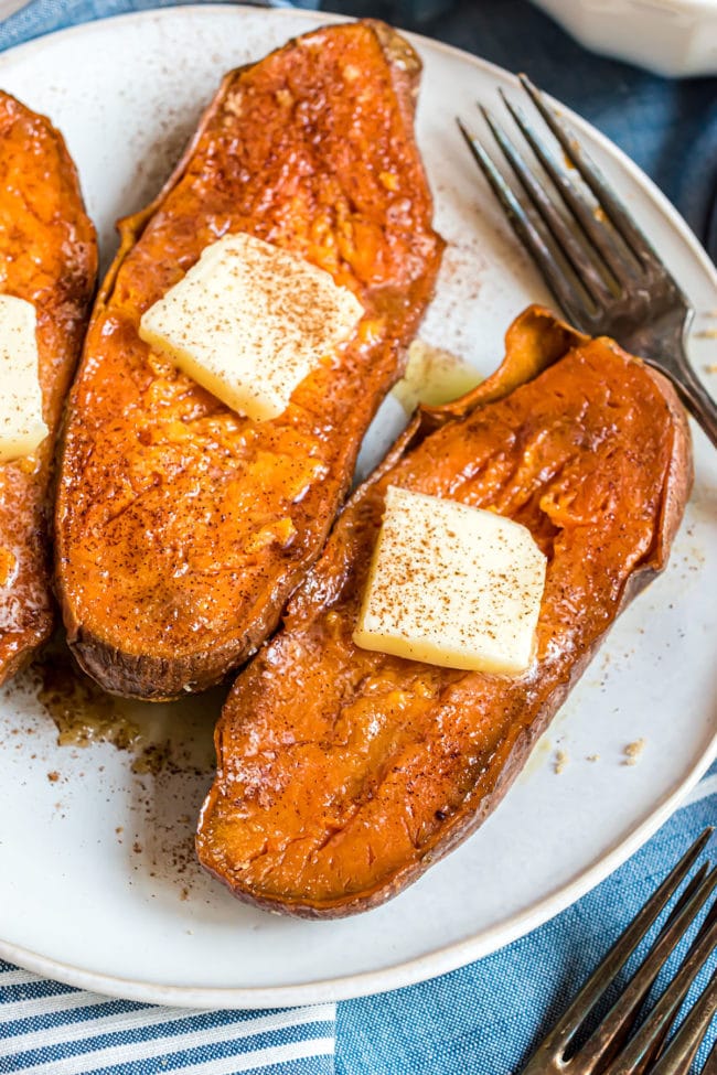 quick baked sweet potatoes with a pat of butter and sprinkle of cinnamon