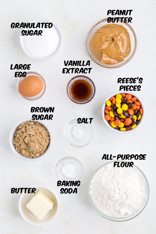 ingredients for making a peanut butter cookies with Reese's Pieces candies