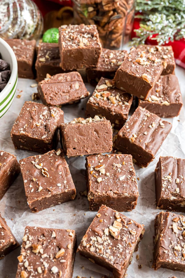 cut squares of microwave fudge with chopped nuts