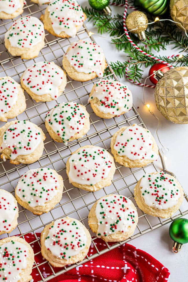 ricotta cookies with Christmas sprinkles on a wire cooling rack