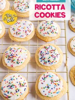 ricotta cookies with rainbow sprinkles on a wire cooling rack