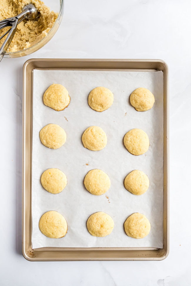 baked cookies on a cookie sheet with parchment paper