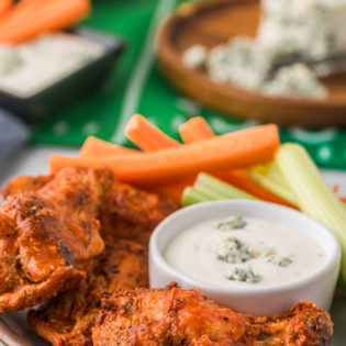 crispy baked wings with buffalo sauce