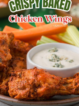 chicken wings with carrots celery and blue cheese on a plate