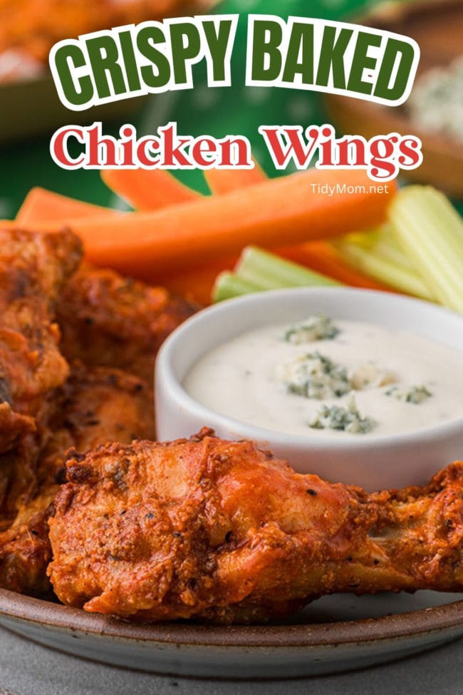 chicken wings with carrots celery and blue cheese on a plate
