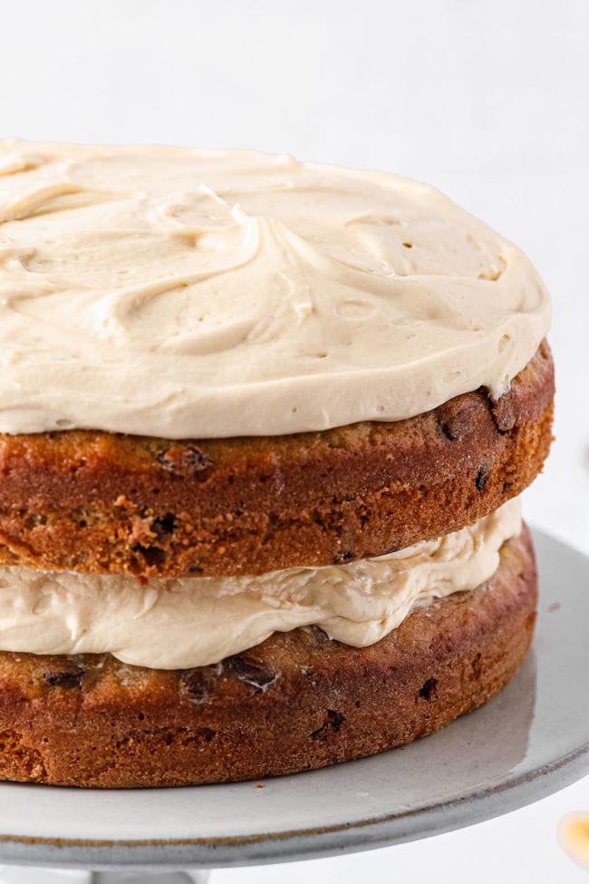 banana cake with frosting between layers