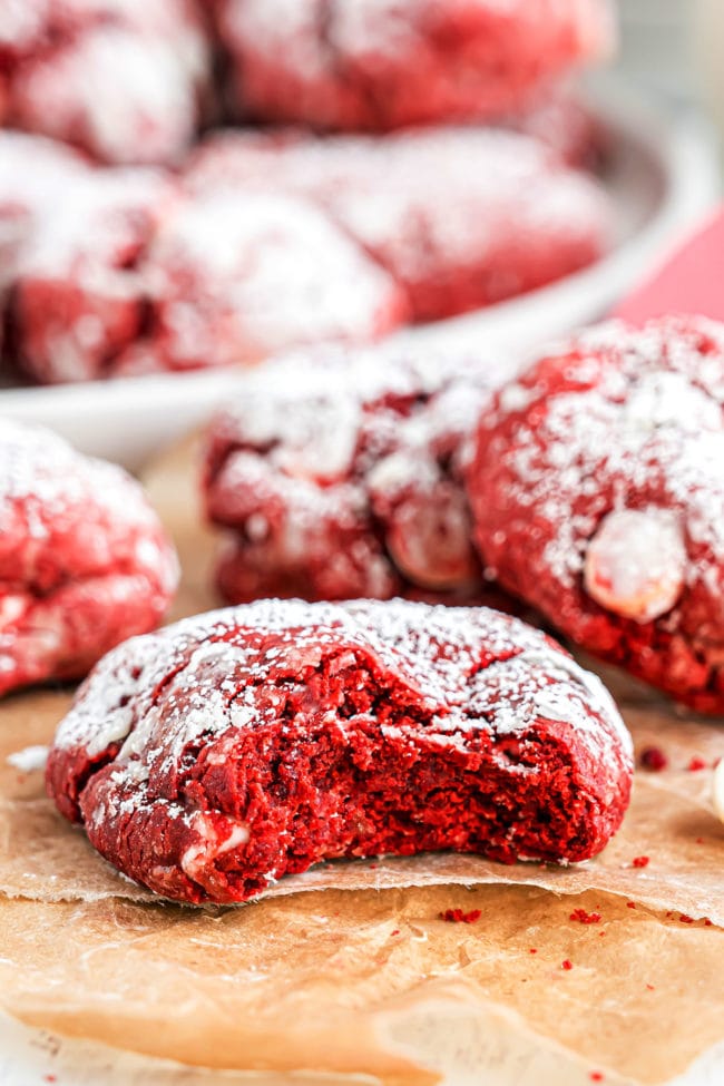 red velvet gooey butter cookie with a bite missing