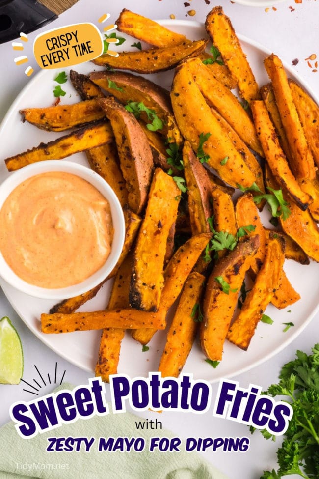 Platter of Air Fryer Crispy sweet potato wedges with zesty dipping sauce.