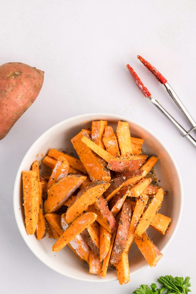 Seasoning sweet potatoes for air fried crispy wedges