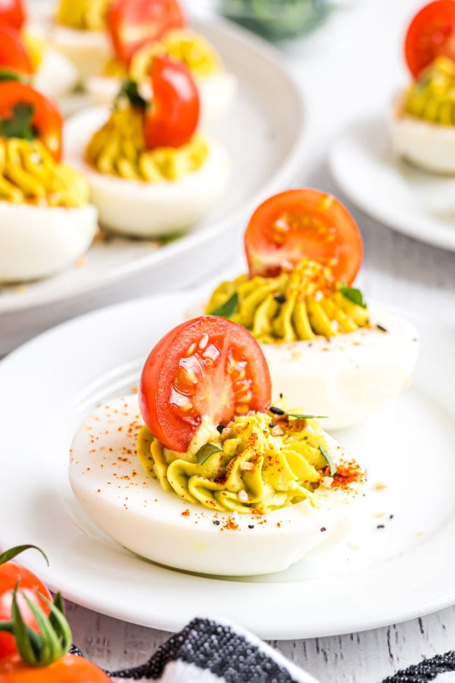 deviled eggs on a white plate