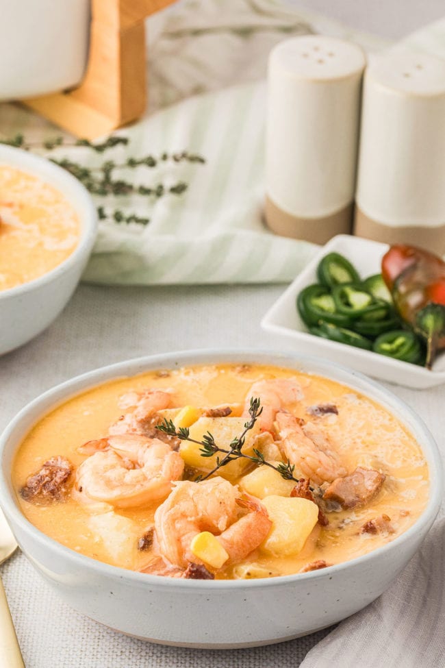 Warm bowl of corn chowder with shrimp and bacon