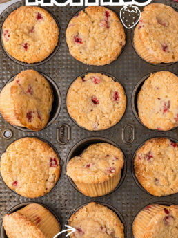 muffin pan with strawberry muffins