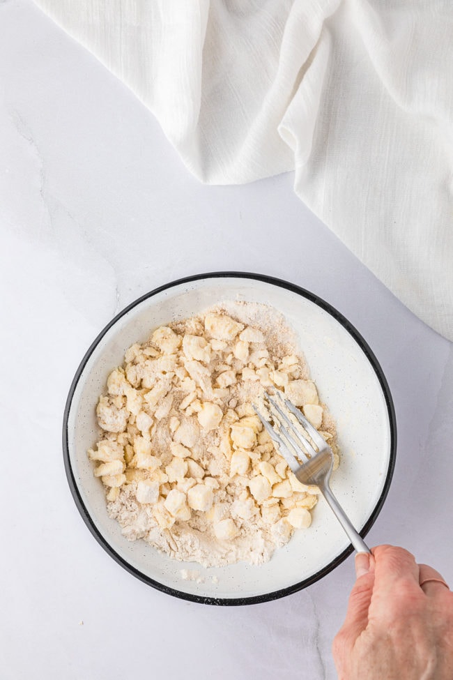 crumb topping in a bowl with a fork