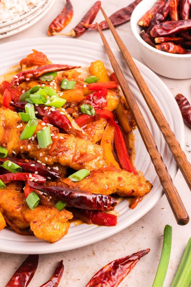 Asian inspired spicy chicken with chopsticks