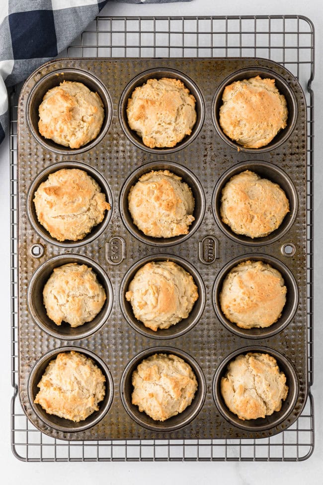 baked biscuits in a muffin tin