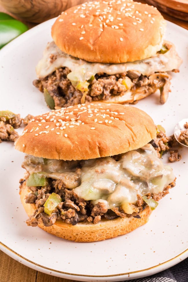 Cheesesteak Sloppy Joes with melted provolone on a platter