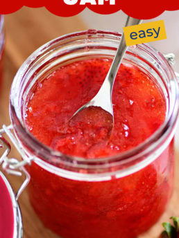 fresh strawberry jam in a canning car with a spoon