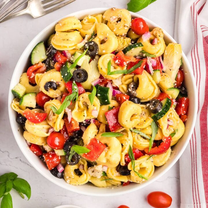 cheese tortellini pasta salad with fresh veggies in a bowl