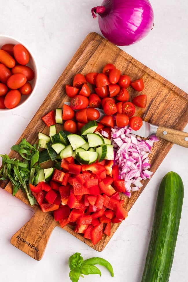 chopped fresh veggies on a wood cutting board