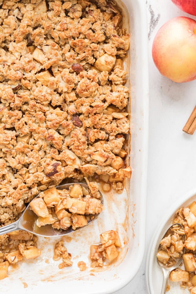 apple crumble in a white baking dish