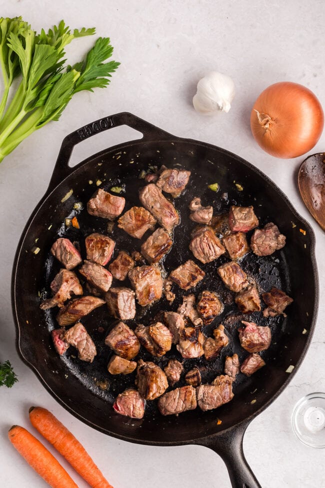 searing beef in a cast iron skillet