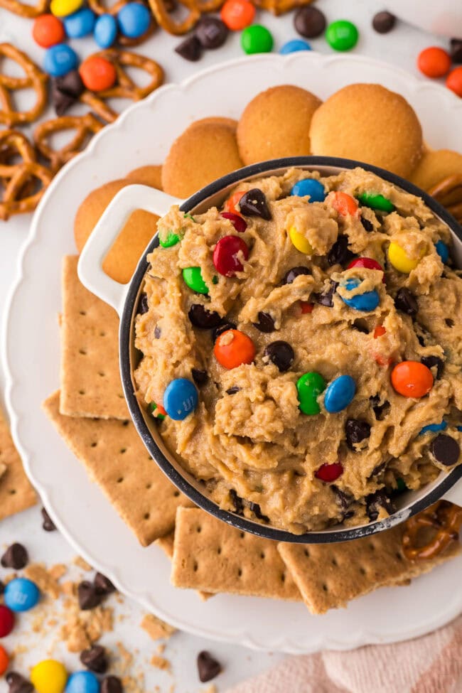 dessert peanut butter dip with cookies and candies