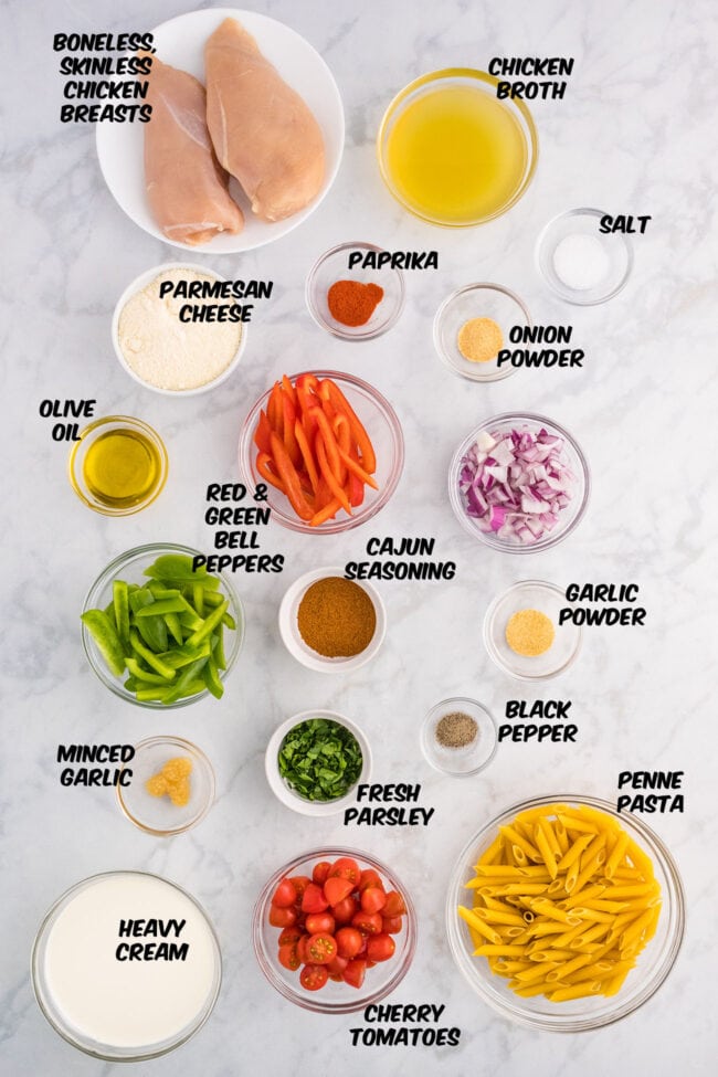 ingredients for cajun chicken pasta on a counter