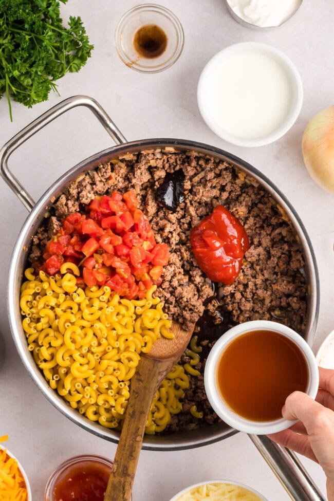 making hamburger casserole in a deep skillet