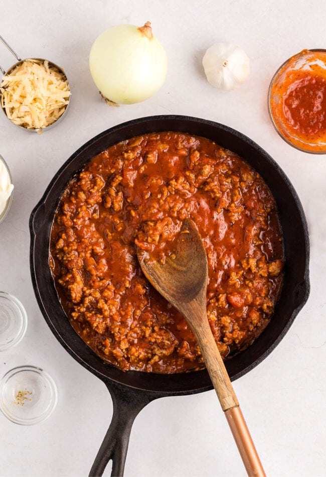 Lasagna Dip meat sauce in a cast iron skillet