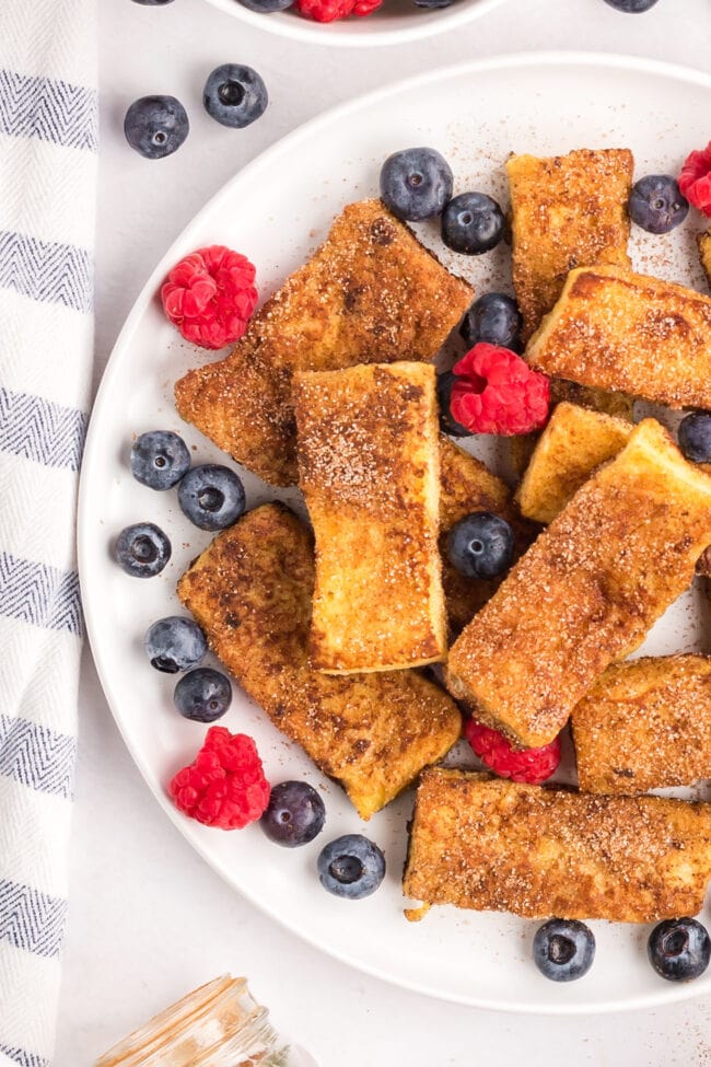 french toast sticks on a white plate