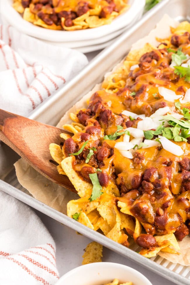 easy cheesy Frito chili pie on a baking sheet