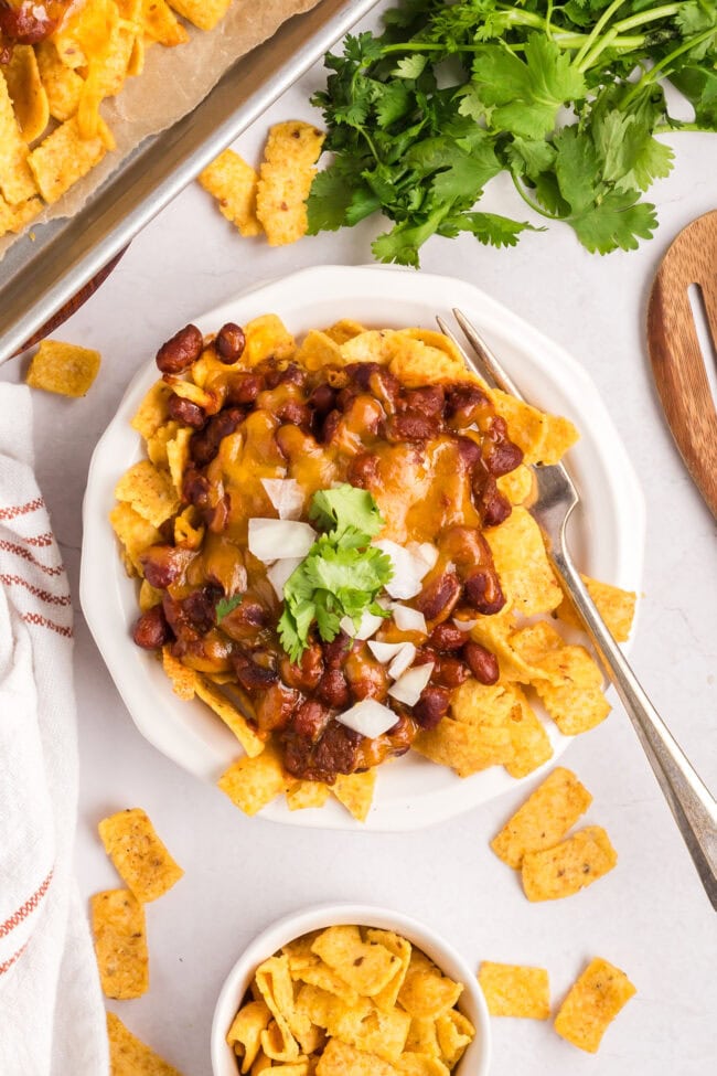 easy Frito chili pie with a fork on a plate