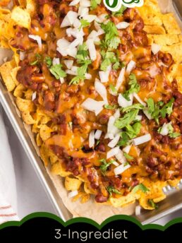 baking sheet with Fritos, chili and cheese