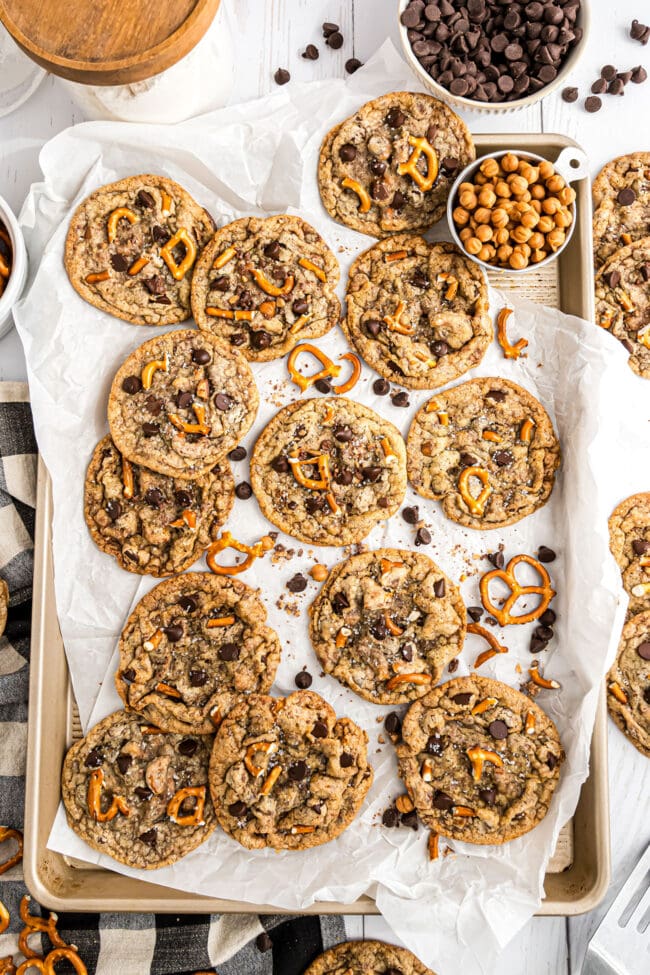 Kitchen Sink Cookies on a pan with parchment paper