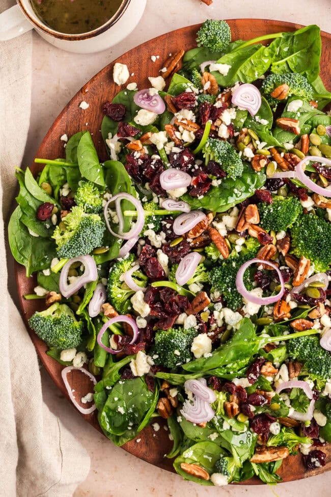 spinach salad with cranberries, pecans, and pumpkin seeds