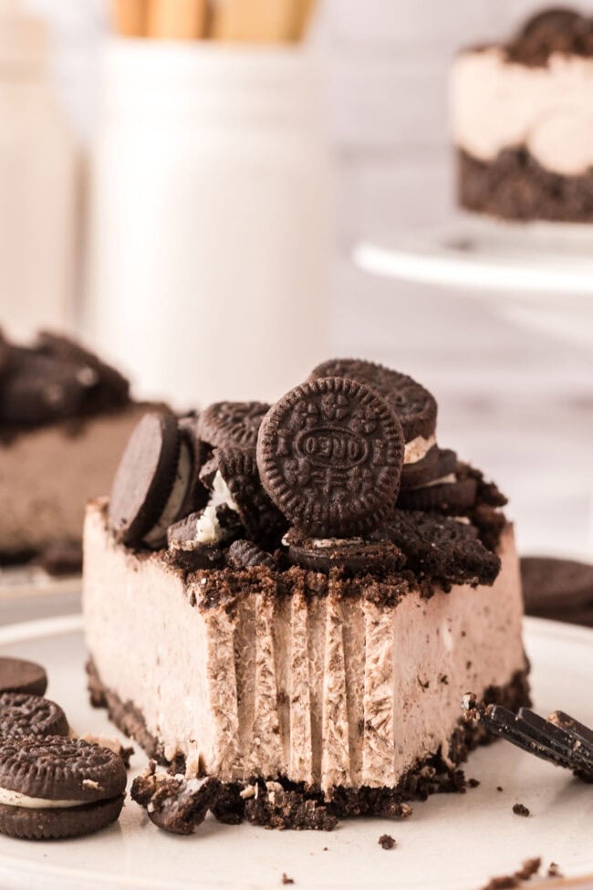 slice of Oreo cheesecake with a bite take.