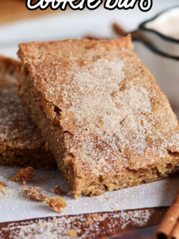 snickerdoodle cookie bars with cinnamon sugar crust