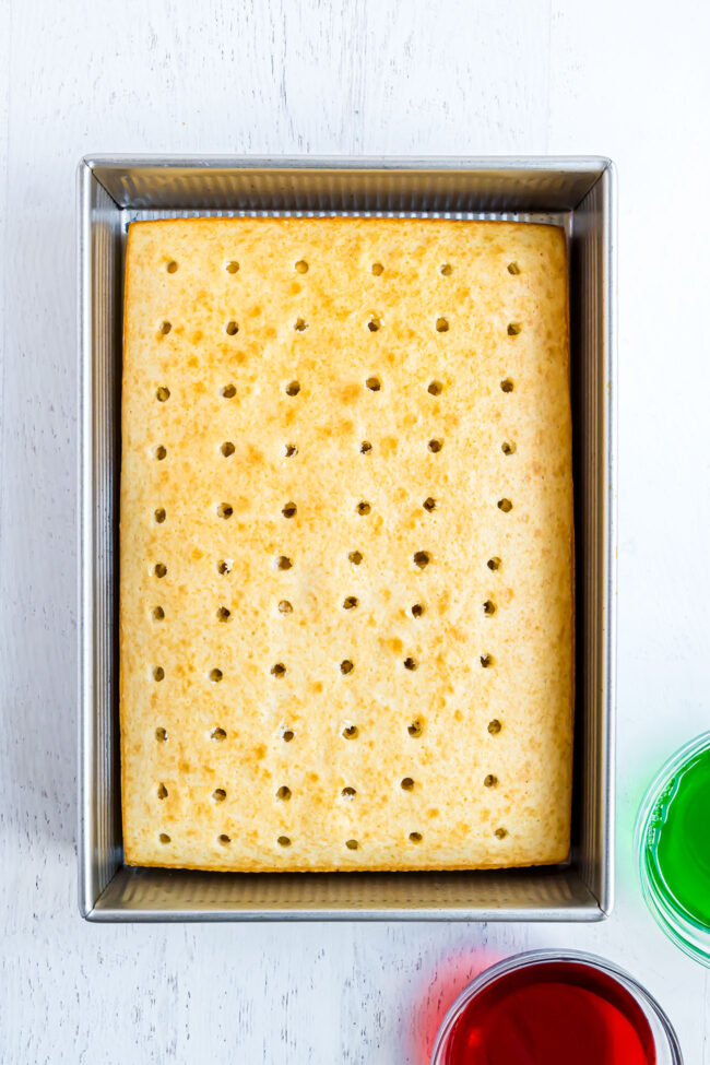 baked cake with holes poked for jello